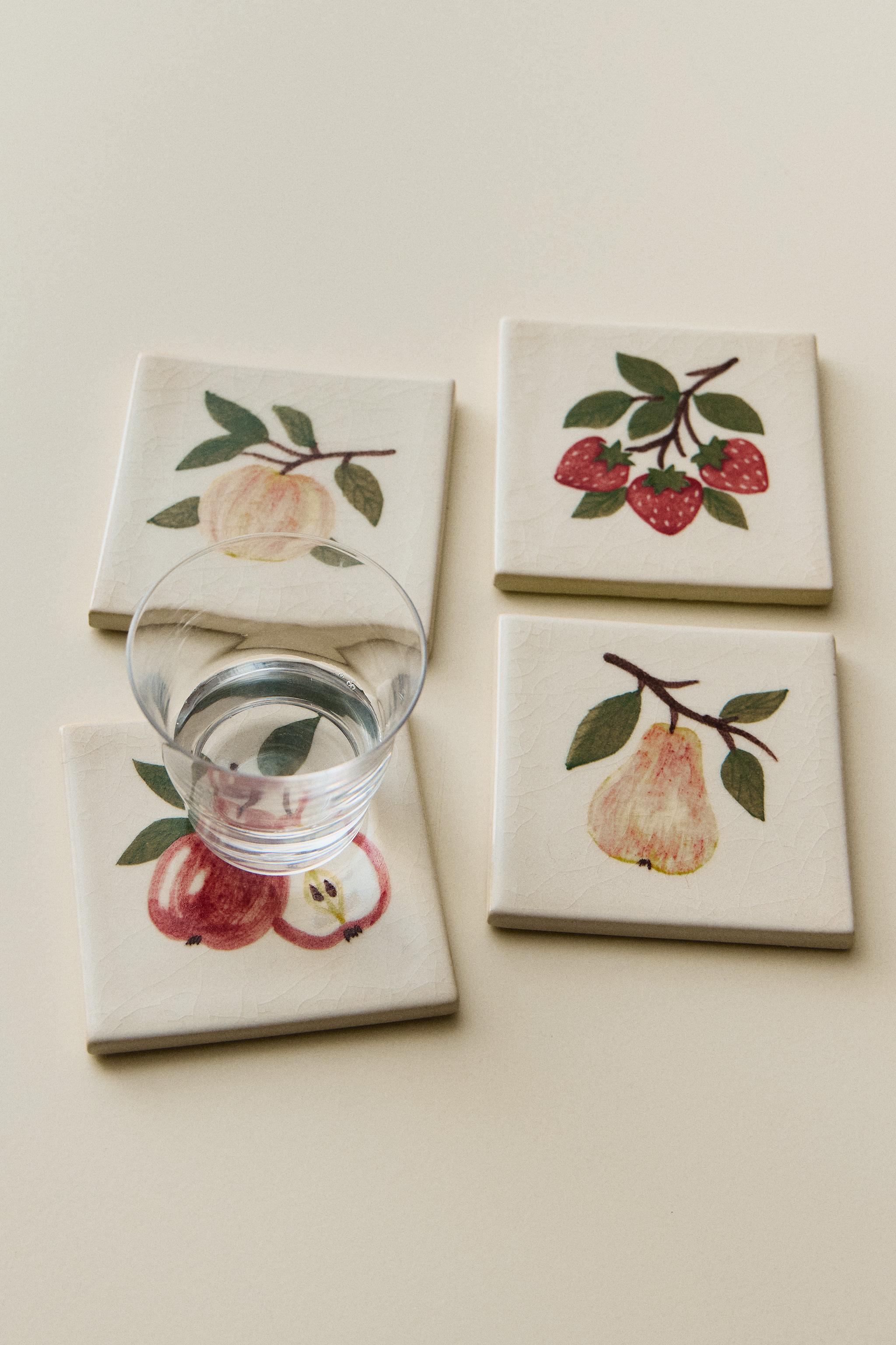 LOT DE 4 DESSOUS DE VERRE EN GRÈS MOTIF FRUITS